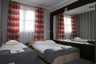 Отель Hotel Sunny Познань Улучшенный двухместный номер с 2 отдельными кроватями-1